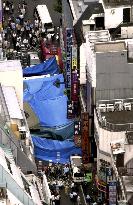 Police continue probe into Tokyo fire